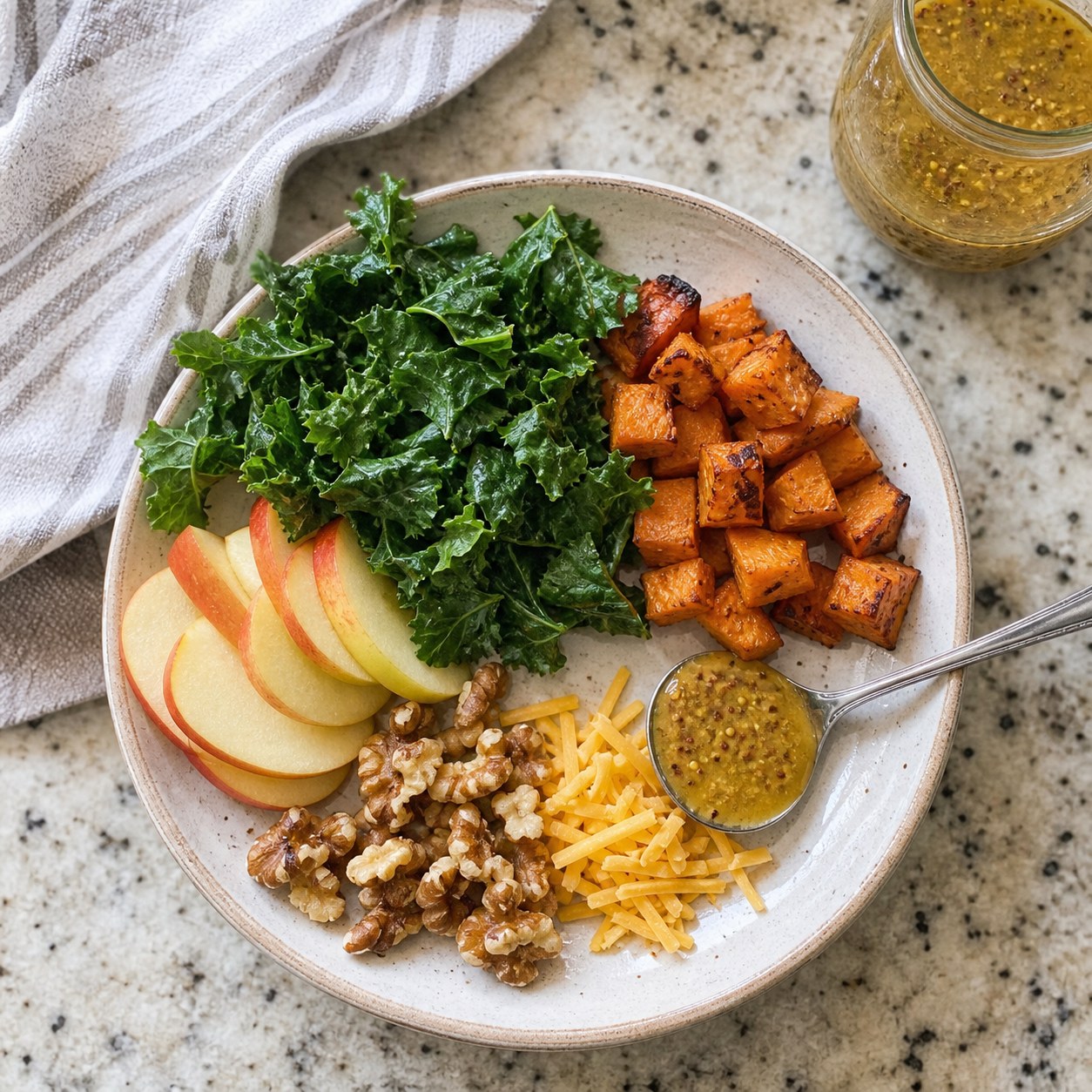 Maple mustard dressing tested with cold kale, roasted sweet potato, apple, walnuts, and cheddar.